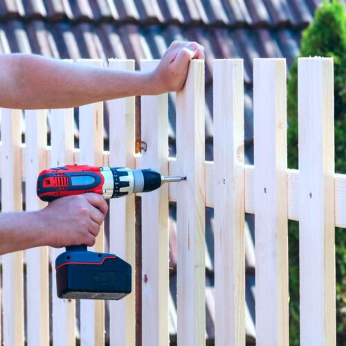building a wooden fence with a drill and screw in silverhill al